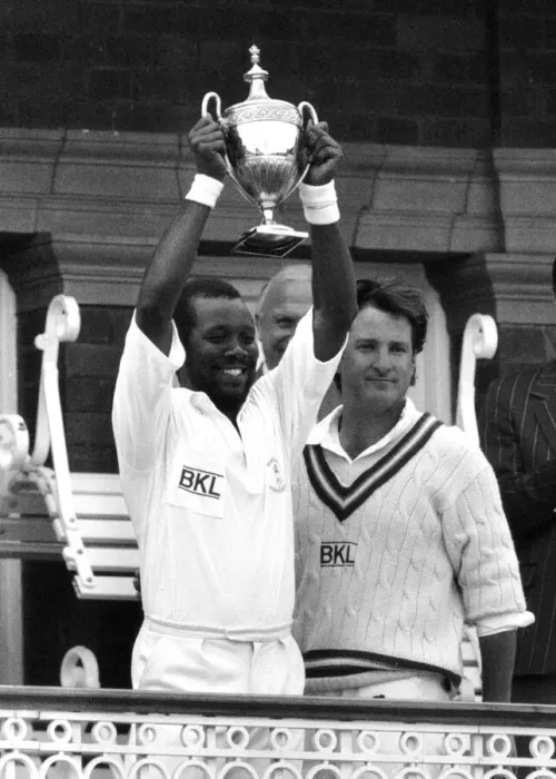 Framed Print : Malcolm Marshall cricketer holding the Benson Hedges Trophy after Hampshire beat Kent by