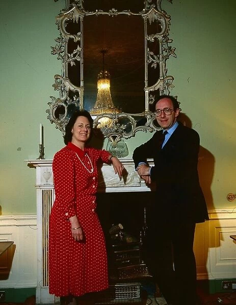 Malcolm Rifkind politician August 1989 with wife Edith standing in front of a mirror at