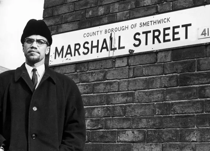 Framed Print : Malcolm X African-American Muslim minister and human rights activist poses beside Framed Print : Malcolm X African-American Muslim minister and human rights activist poses beside