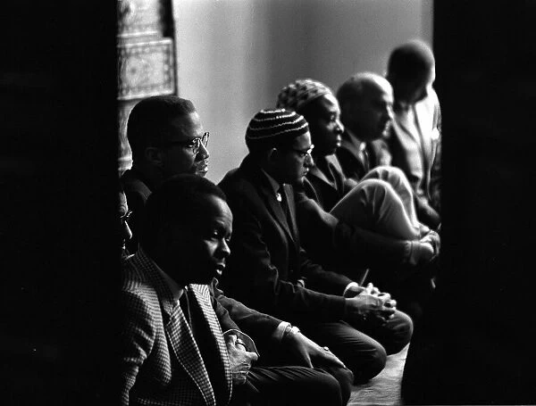 Malcolm X Jul 1964 praying in mosque
