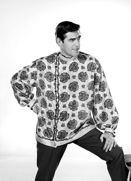 Male model Peter Christian wearing silk shirt. Circa 1964
