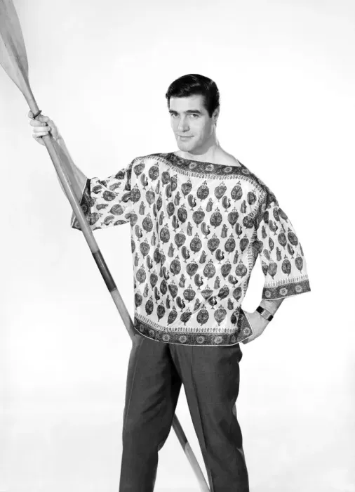 Framed Print : Male model Peter Christian wearing silk shirt seen here holding a oar. Circa 1964 Framed Print : Male model Peter Christian wearing silk shirt seen here holding a oar. Circa 1964