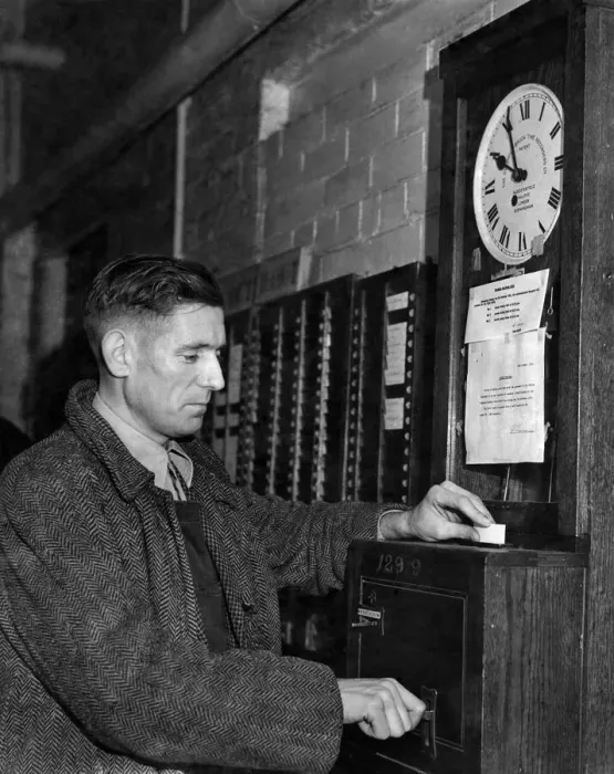 Framed Print : Man clocking on at work. November 1955 P002982 Framed Print : Man clocking on at work. November 1955 P002982
