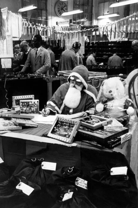 Framed Print : Man dressed as Father Christmas at a post office. 14th December 1966 Framed Print : Man dressed as Father Christmas at a post office. 14th December 1966