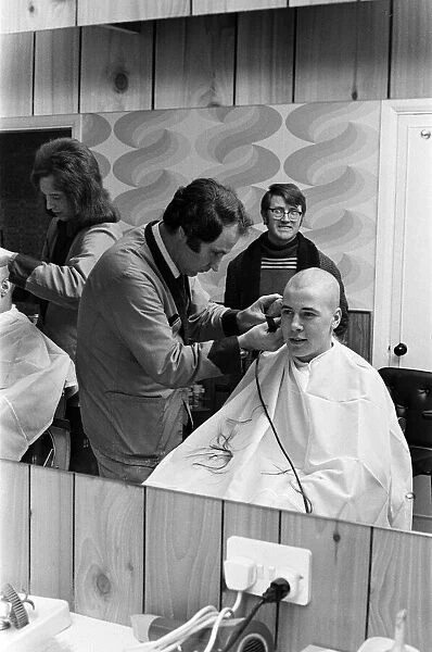 A man getting a 'Kojak'hair cut. 1975