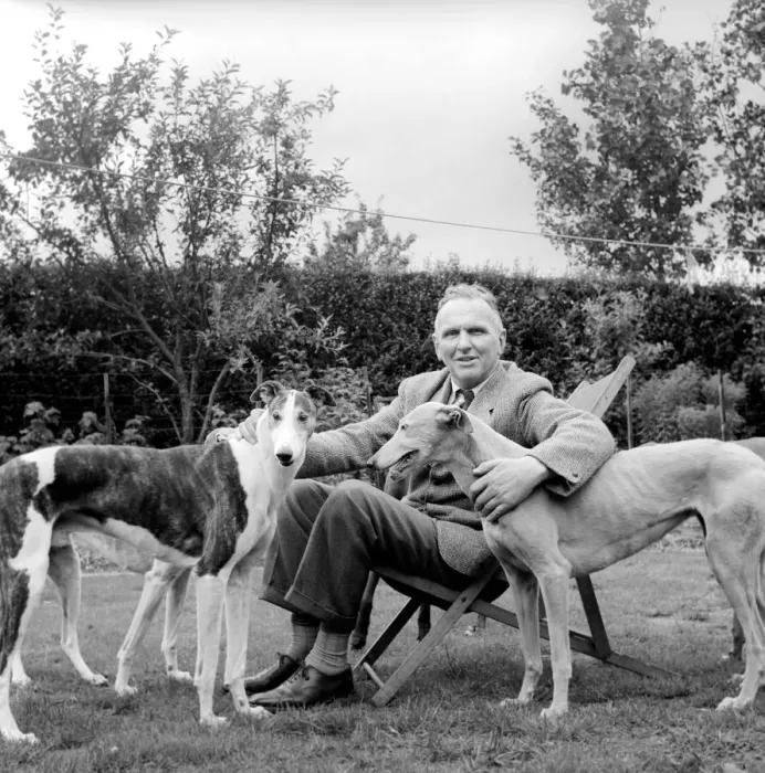 Framed Print : Man and Greyhounds: Frank Sanderson seen here at his St