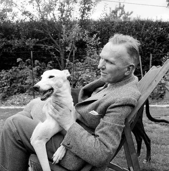 Man and Greyhounds: Frank Sanderson seen here at his St