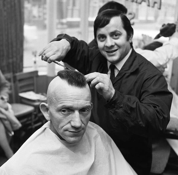 A man having a Mohican haircut in Middlesbrough. Circa 1971