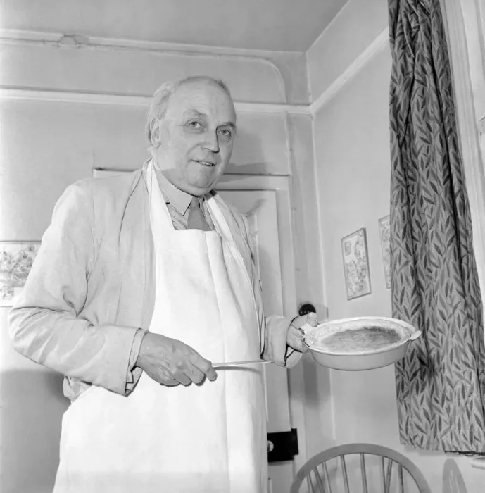 Framed Print : Man in Kitchen. September 1953 D5459-001 Framed Print : Man in Kitchen. September 1953 D5459-001