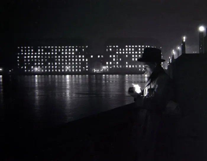Framed Print : A man lights a cigarette on the Thames embankment in London Circa 1955 people Framed Print : A man lights a cigarette on the Thames embankment in London Circa 1955 people