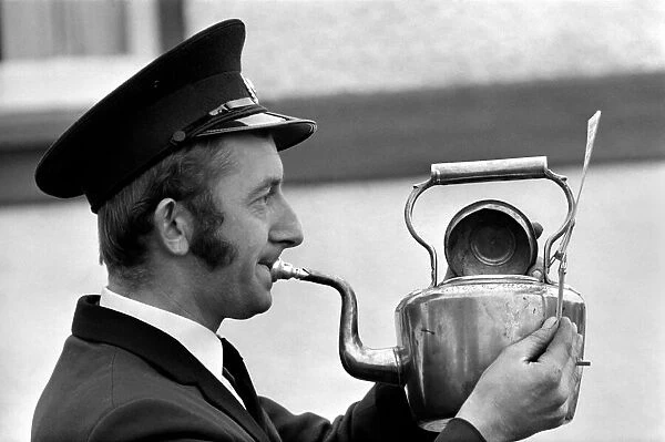 Man playing the kettle for the Pilling Jubilee Silver Band. November 1969