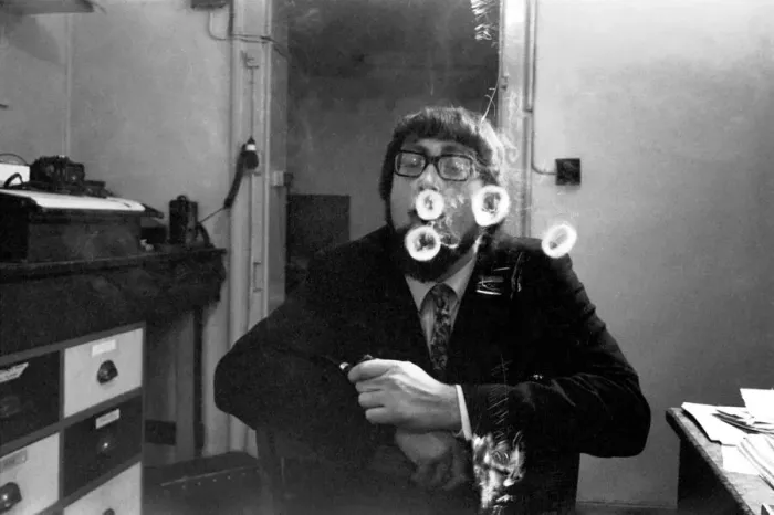 Framed Print : A man smoking a cigarette blowing smoke rings. November 1969 Z12004-009 Framed Print : A man smoking a cigarette blowing smoke rings. November 1969 Z12004-009