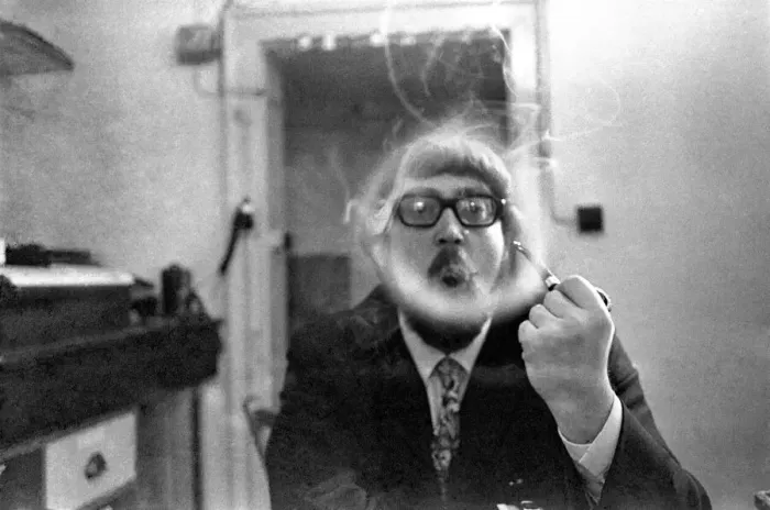 Framed Print : A man smoking a cigarette blowing smoke rings. November 1969 Z12004-008 Framed Print : A man smoking a cigarette blowing smoke rings. November 1969 Z12004-008