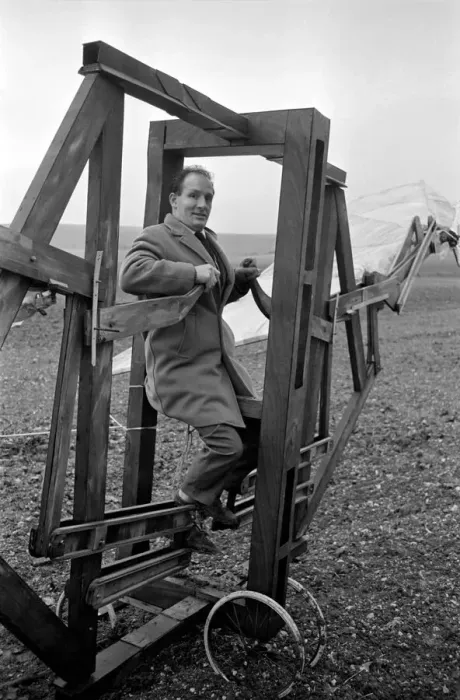 Framed Print : A man trues out his home made flying machine in a field in Wiltshire Framed Print : A man trues out his home made flying machine in a field in Wiltshire
