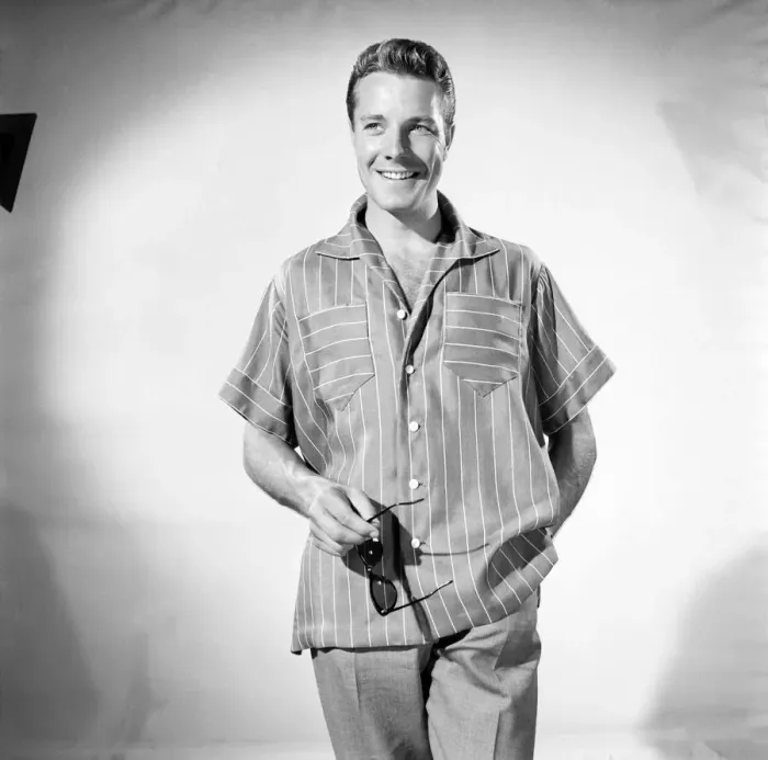 Framed Print : Man wearing shorts sleeve shirt. 1960