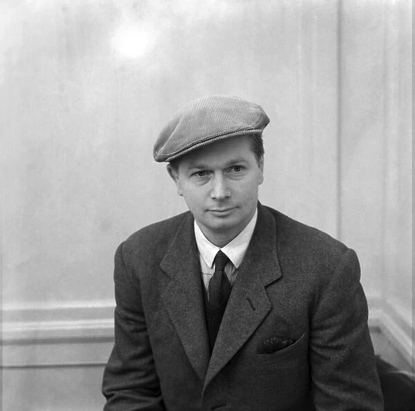 Man Wearing a suit and cap. October 1952 C4935
