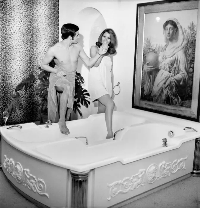Framed Print : Man and woman sharing a bath designed for two. November 1969 Z10586 Framed Print : Man and woman sharing a bath designed for two. November 1969 Z10586