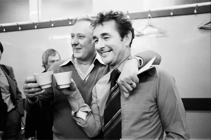 Framed Print : Manager Brian Clough celebrates in the dressing room with assistant Peter Taylor after Framed Print : Manager Brian Clough celebrates in the dressing room with assistant Peter Taylor after
