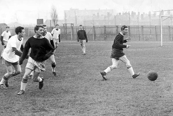 Manager Jimmy Hagan of West Bromwich Albion, with the ball at his foot