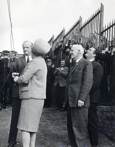 manager jock stein and chairman bob kelly watch mrs kelly unfurl the league flag at