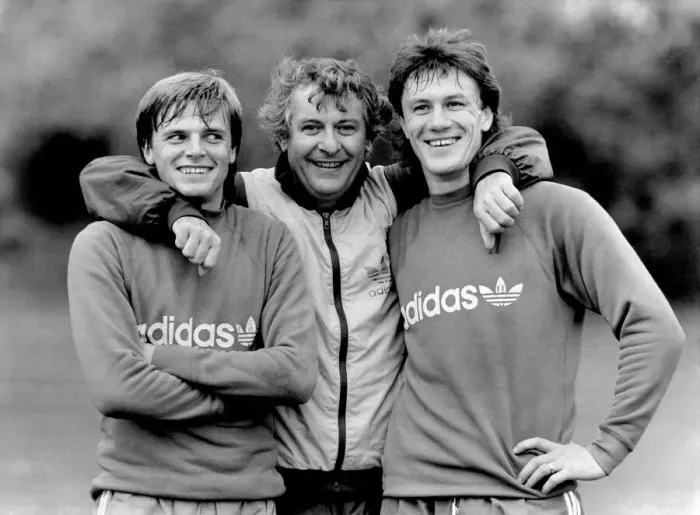 Framed Print : Manager Mullery gets to grips with his Strikers Gary Bannister (left) and Simon Stainrod