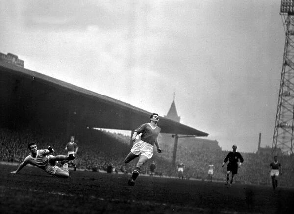 A Manchester City cross is intercepted by Manchester United