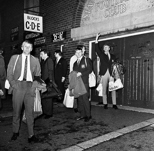 Manchester City football team leave Maine Road as they go to celebrate in a Manchester