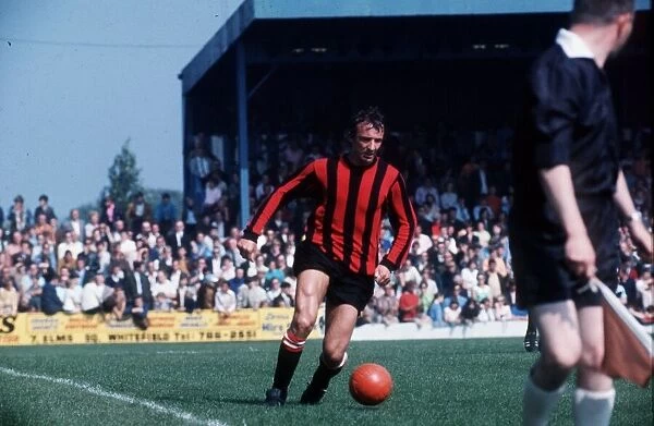 Manchester City footballer Mike Summerbee in action. Circa 1969