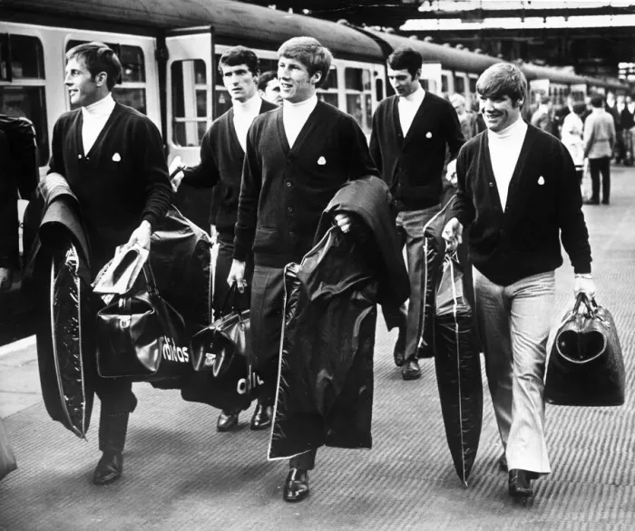 Framed Print : Manchester City players about to board the train at Picadilly station on their way to