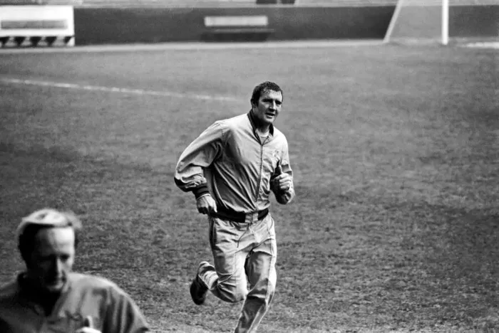 Framed Print : Manchester City training Assistant manager Malcolm Allison sweats it out trying to