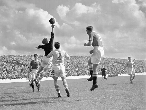 Manchester City v Chelsea Division One 1954  /  55. City goalkeeper Bert Trautmann gets his
