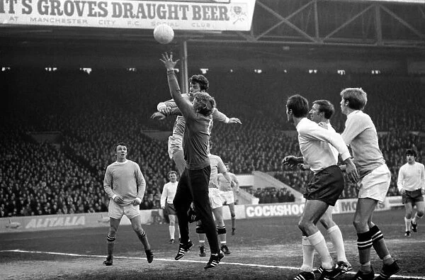 Manchester City v. Leeds United. Booth the Manchester City centre half chellenges Sparke