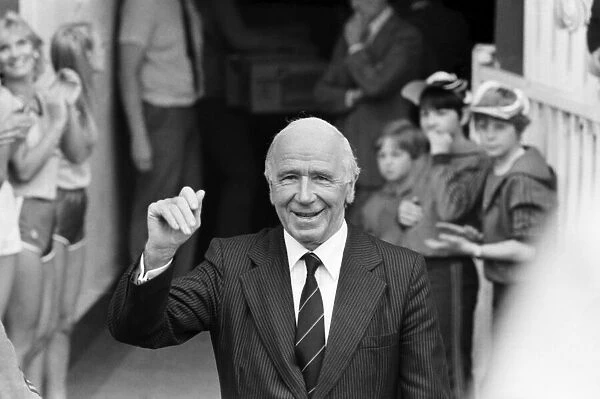 Manchester United 2 v. Stoke City 0. Division 1 Football. Sir Matt Busby waves to fans