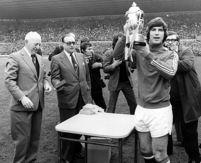 Framed Print : Manchester United captain Martin Buchan April 1975 holding the 2nd Second