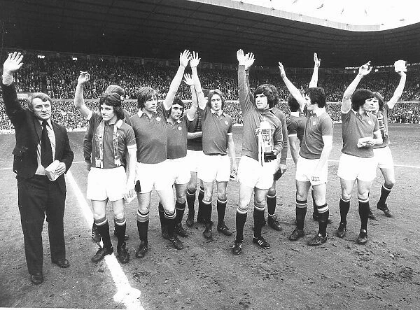 Manchester United captain Martin Buchan April 1975 holding the 2nd Second