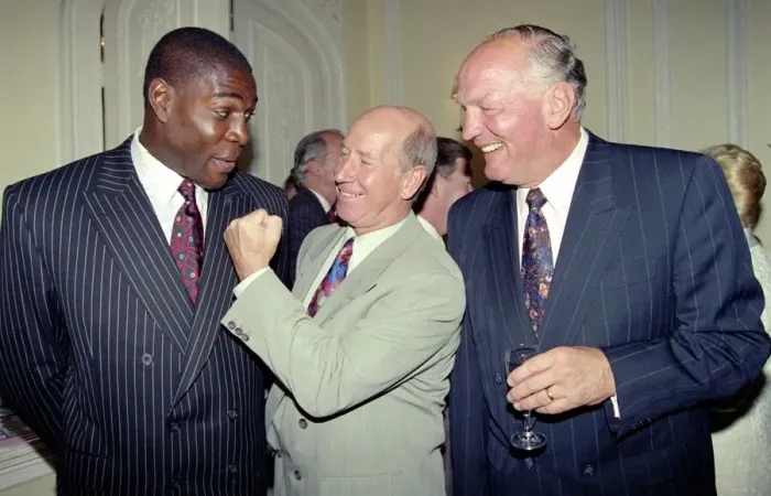 Framed Print : Former Manchester United and England footballer Bobby Charlton hams it up with boxers Framed Print : Former Manchester United and England footballer Bobby Charlton hams it up with boxers