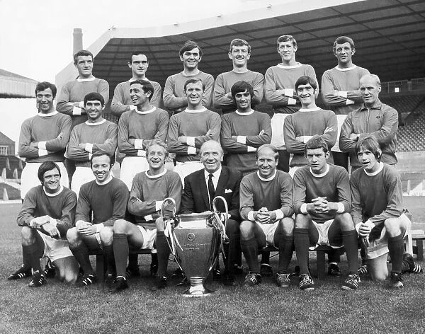 Manchester United European Cup winning team poses with the trophy at Old Trafford 1968