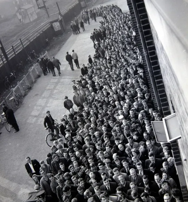 Framed Print : Manchester United fans queue for tickets at Old Trafford for the FA Cup semi final match