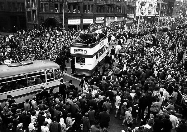 Manchester United FC win The European Cup - 1968 crowds cheer as the team makes