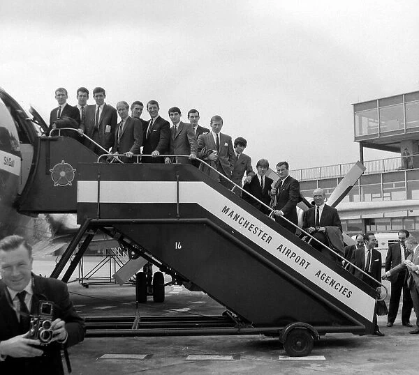Manchester United Football Team at Manchester Airport - on their way to play Strasbourg