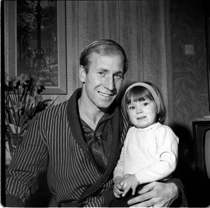 Framed Print : Manchester United footballer Bobby Charlton with daughter Suzanne at home March Framed Print : Manchester United footballer Bobby Charlton with daughter Suzanne at home March