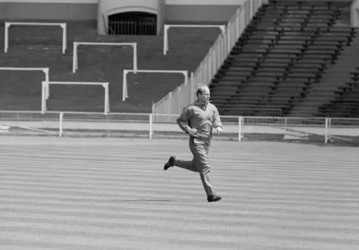 Framed Print : Manchester United footballer Bobby Charlton warms up at an empty Wembley Stadium prior to
