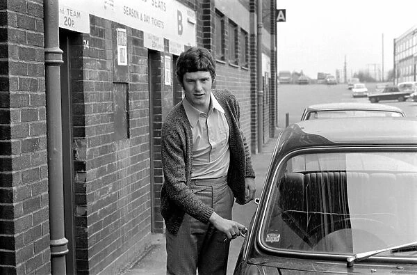 Manchester United footballer Brian Kidd leaves Old Trrfford training in his car following