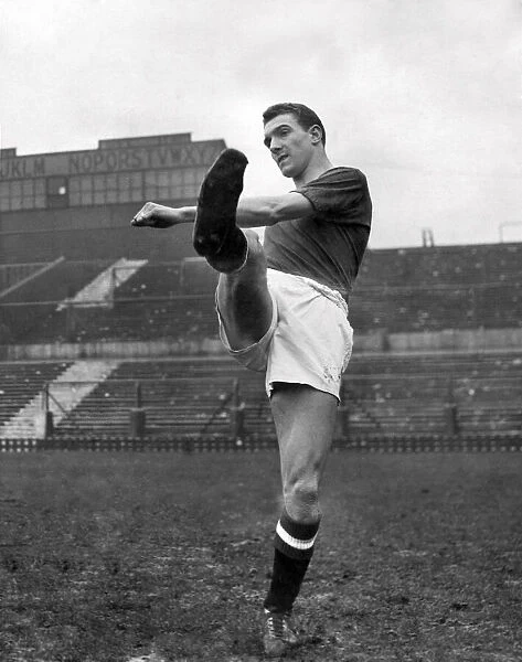 Manchester United footballer Bill Foulkes during a training session. March 1957