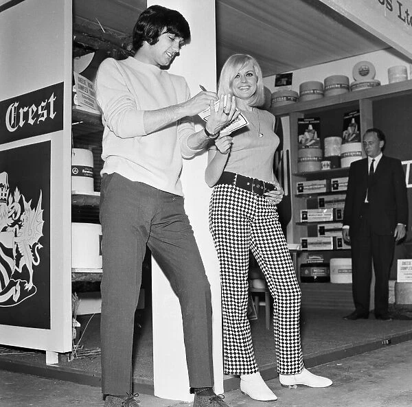 Manchester United footballer George Best at Manchester Exhibition Hall with Sue Hawley