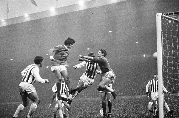 Manchester United footballer George Best in action to score his second goal with a header