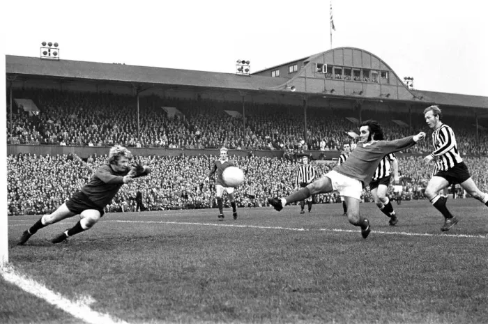 Framed Print : Manchester United footballer George Best in action against Newcastle United during