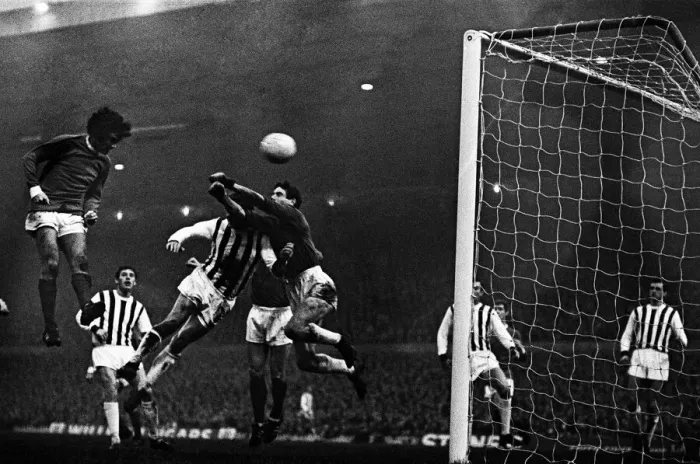 Framed Print : Manchester United footballer George Best in action to score his second goal with a header