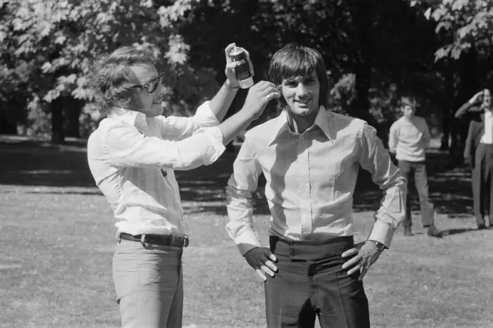 Framed Print : Manchester United footballer George Best has hair spray applied by his personal