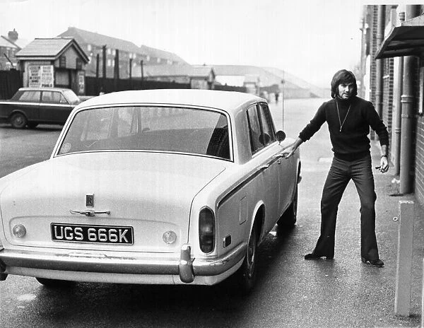 Manchester United footballer George Best seen here arriving at Old Trafford for a